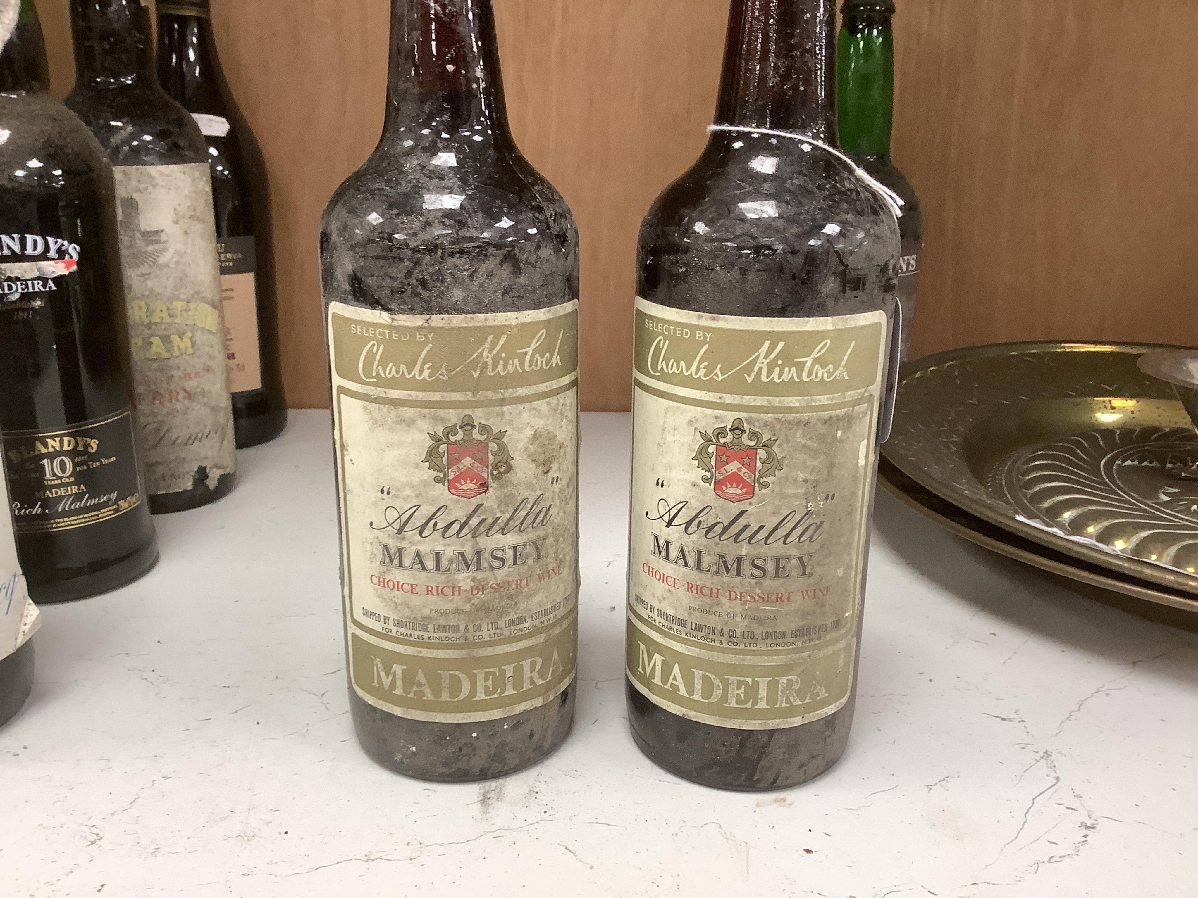 Twelve bottles of various Ports, Madeiras and Sherry, including a bottle of Graham’s vintage Port 1977. Condition - storage unknown